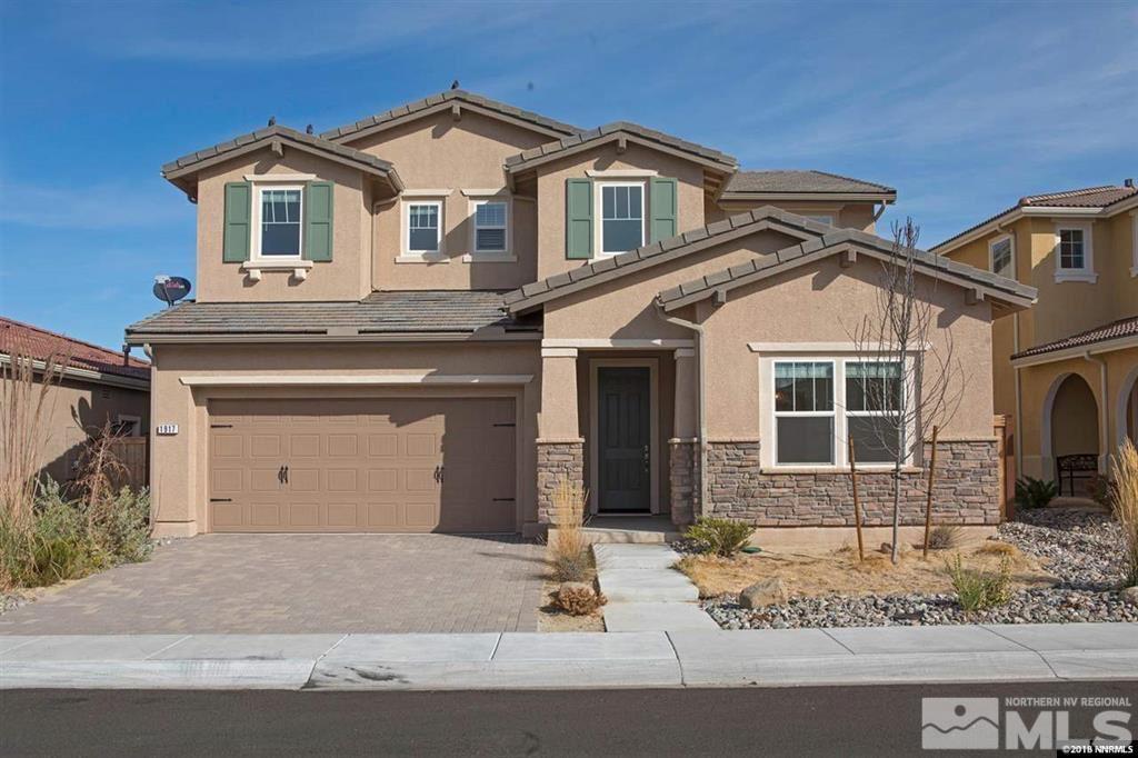 1917 Wind Walker Drive Reno, NV 89521 - Photo 1 of 14 a front view of a house with garden
