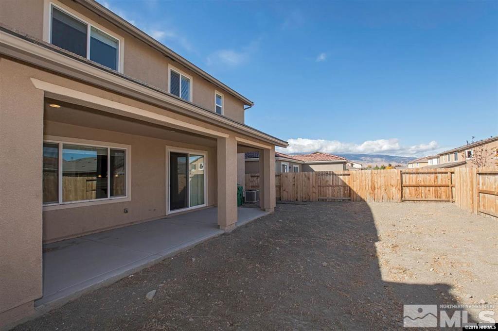 1917 Wind Walker Drive Reno, NV 89521 - Photo 14 of 14 a front view of a house with a garage