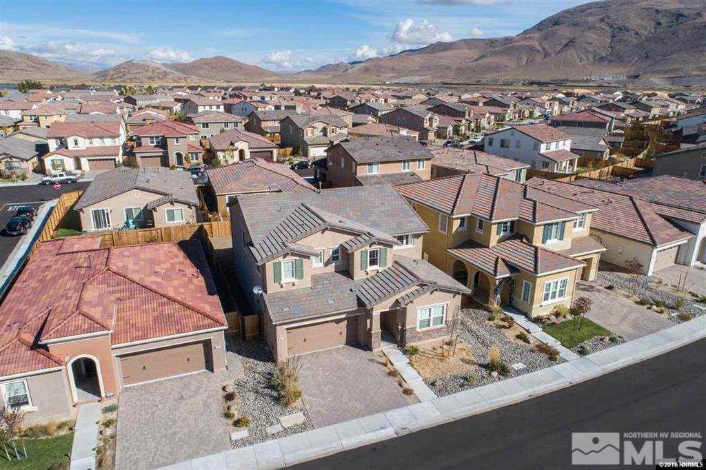 1917 Wind Walker Drive Reno, NV 89521 - Photo 3 of 14 an aerial view of residential houses with outdoor space