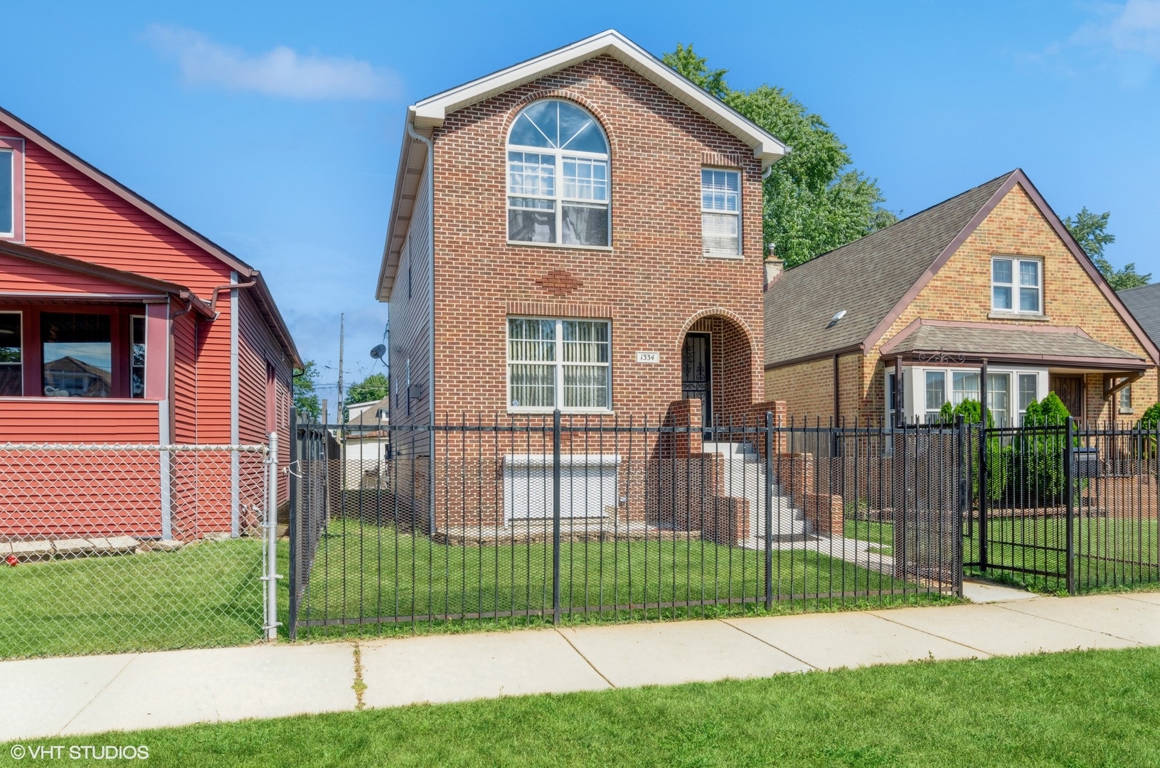 1334 West 98th Street Chicago, IL 60643 - Photo 1 of 15 a front view of a house with a yard