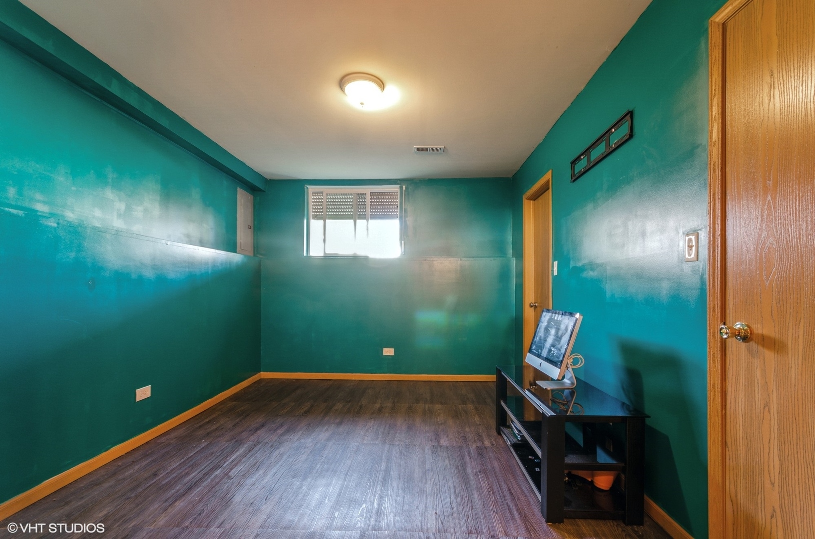 1334 West 98th Street Chicago, IL 60643 - Photo 13 of 15 a view of a room with wooden floor and windows