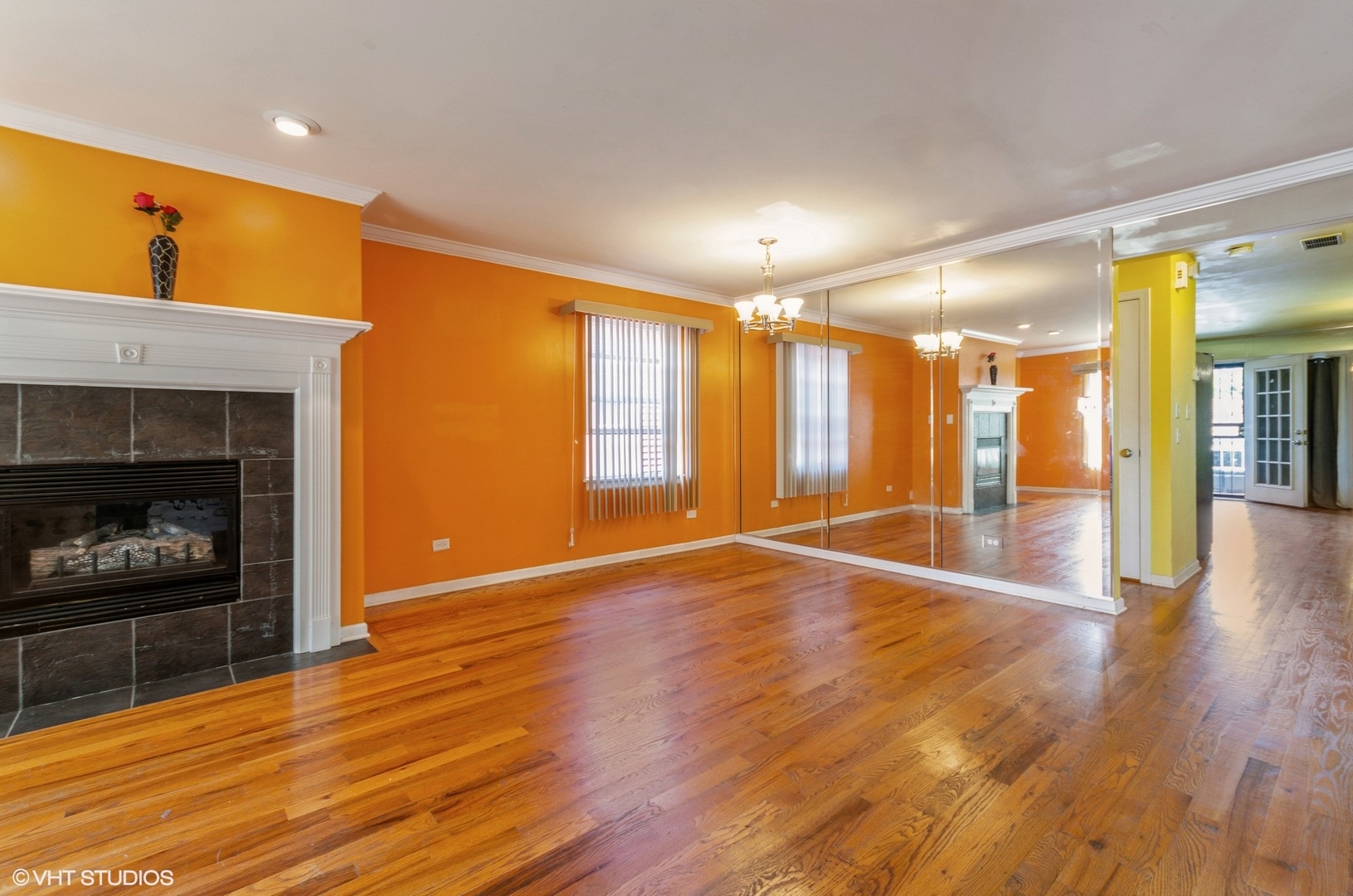 1334 West 98th Street Chicago, IL 60643 - Photo 3 of 15 a view of an empty room with window and fire place
