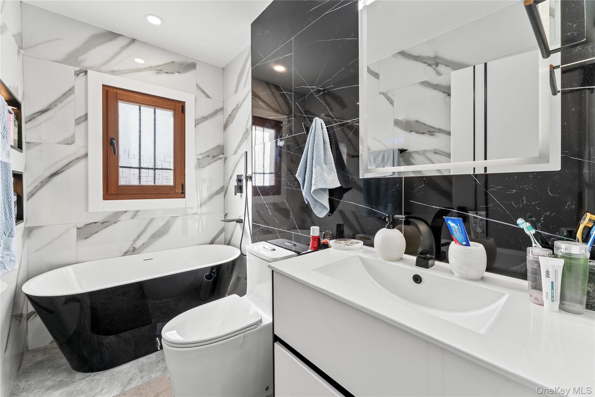 719 Wilmot Road Scarsdale, NY 10583 - Photo 17 of 29 3rd Bathroom - Hallway