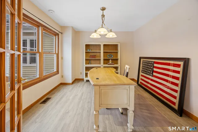 a view of livingroom with furniture and wooden floor