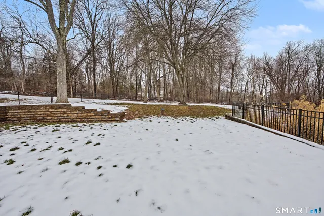a view of a backyard of snow