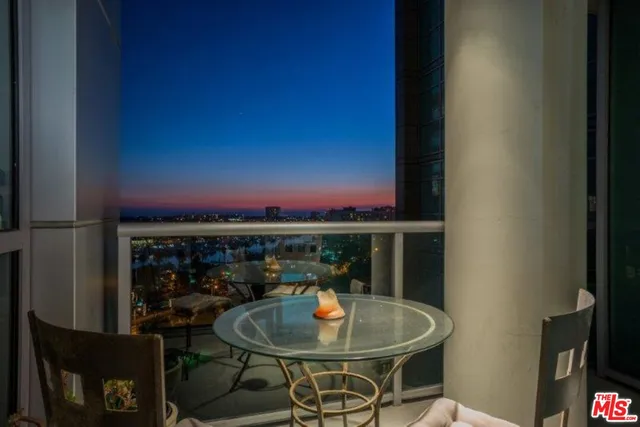 a dining room with furniture and a fireplace