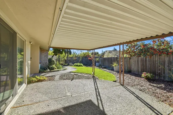 a house view with a backyard space