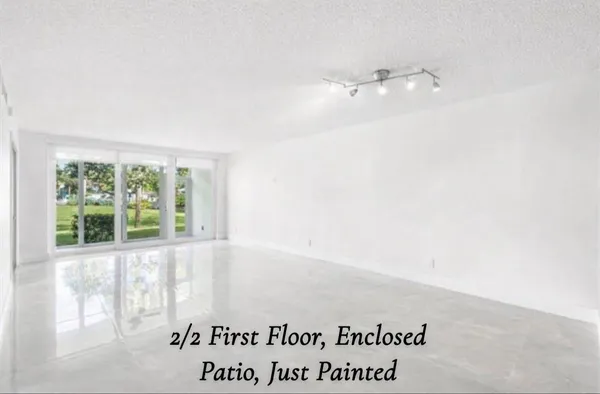a view of a big room with wooden floor