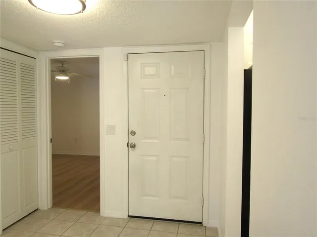 a view of a bathroom with a glass door