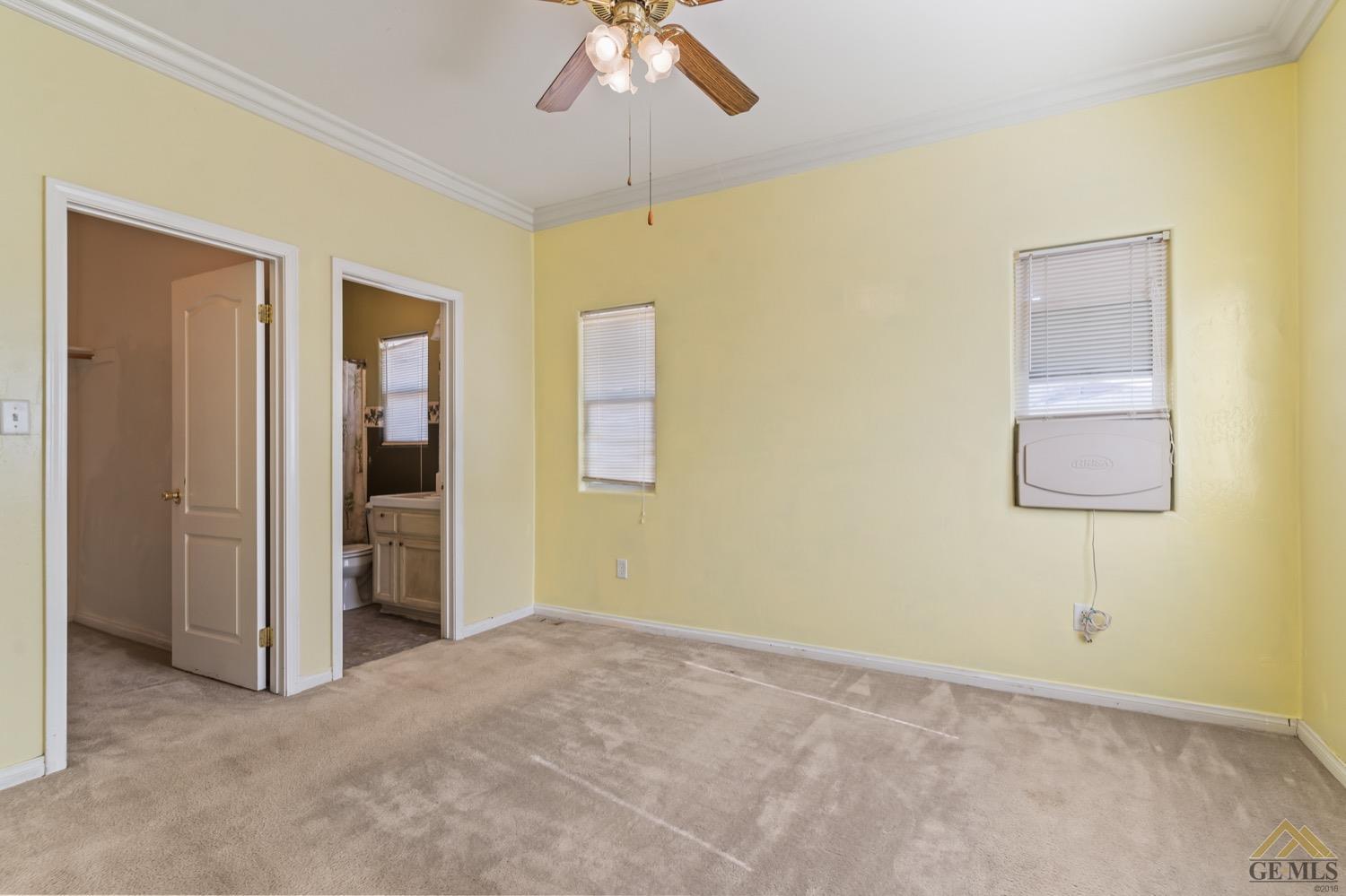 Undisclosed Address Bakersfield, CA 93306 - Photo 12 of 28 wooden floor and windows in a room