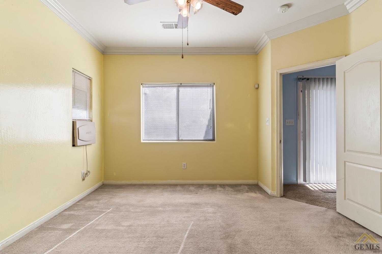 Undisclosed Address Bakersfield, CA 93306 - Photo 14 of 28 a view of an empty room with a window