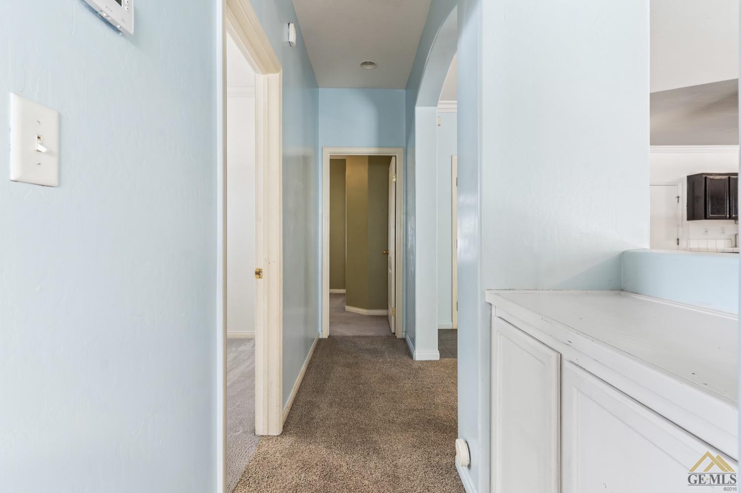 Undisclosed Address Bakersfield, CA 93306 - Photo 16 of 28 a view of a kitchen from the hallway
