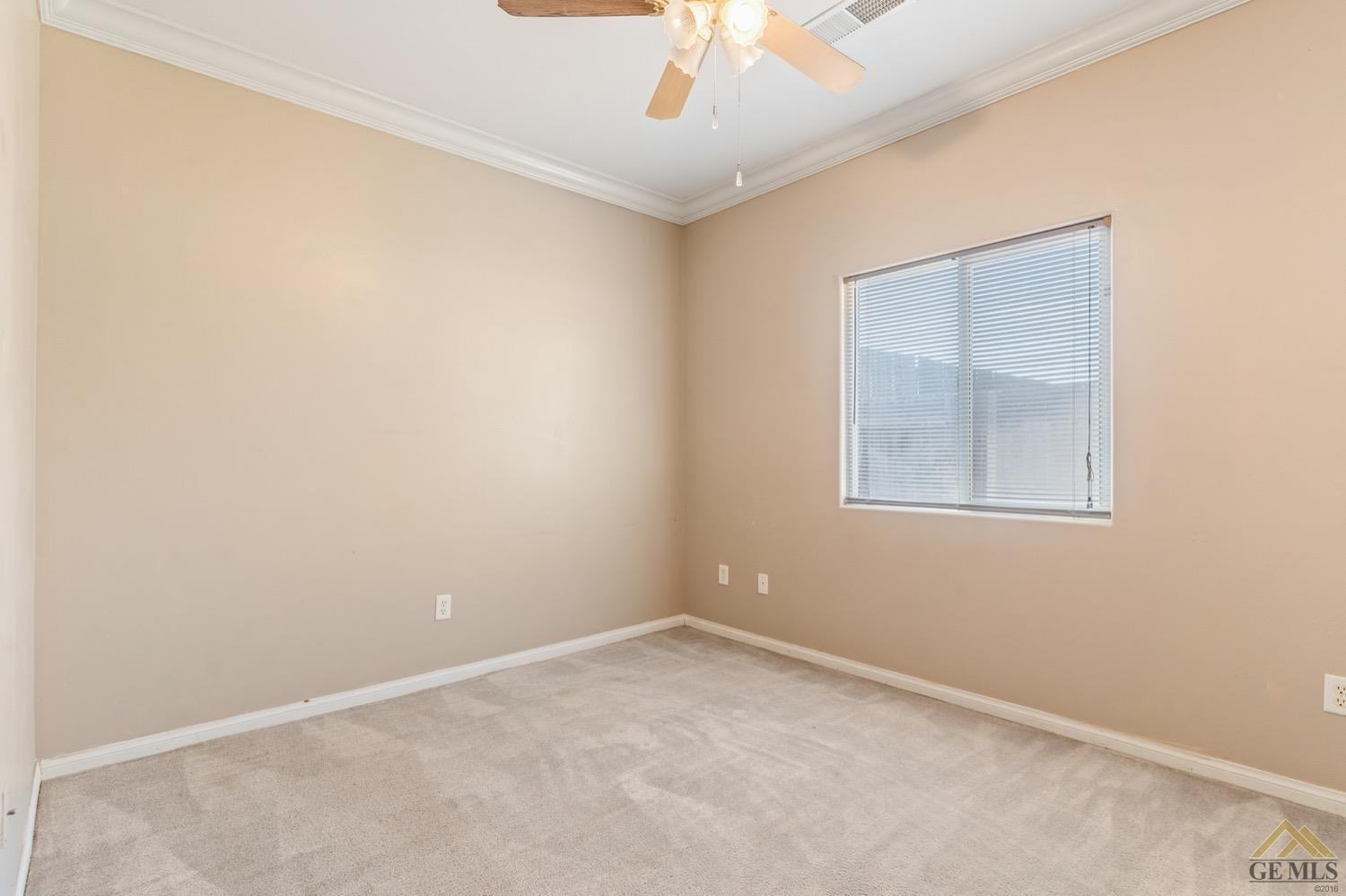 Undisclosed Address Bakersfield, CA 93306 - Photo 18 of 28 an empty room with a window
