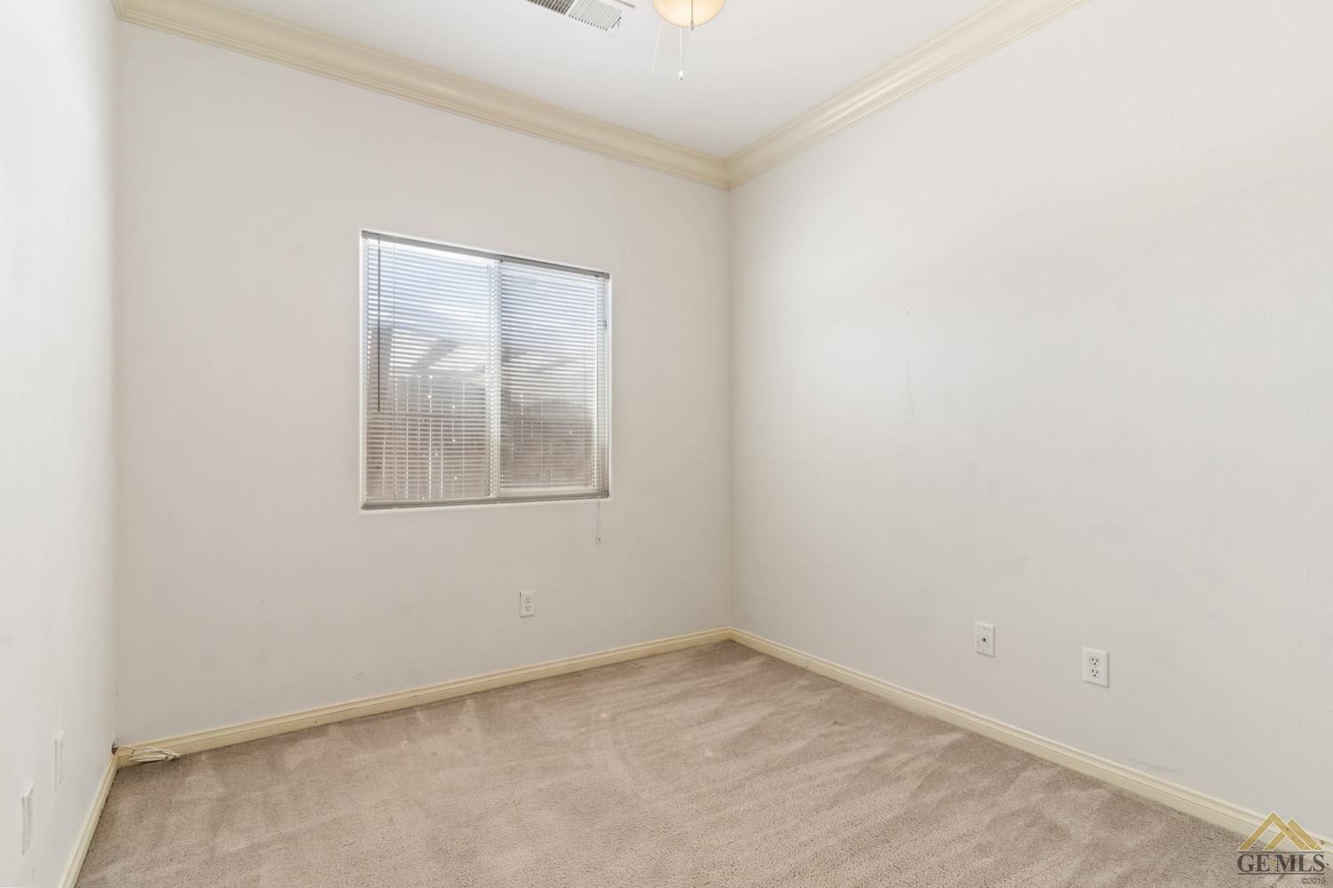 Undisclosed Address Bakersfield, CA 93306 - Photo 20 of 28 an empty room with a window