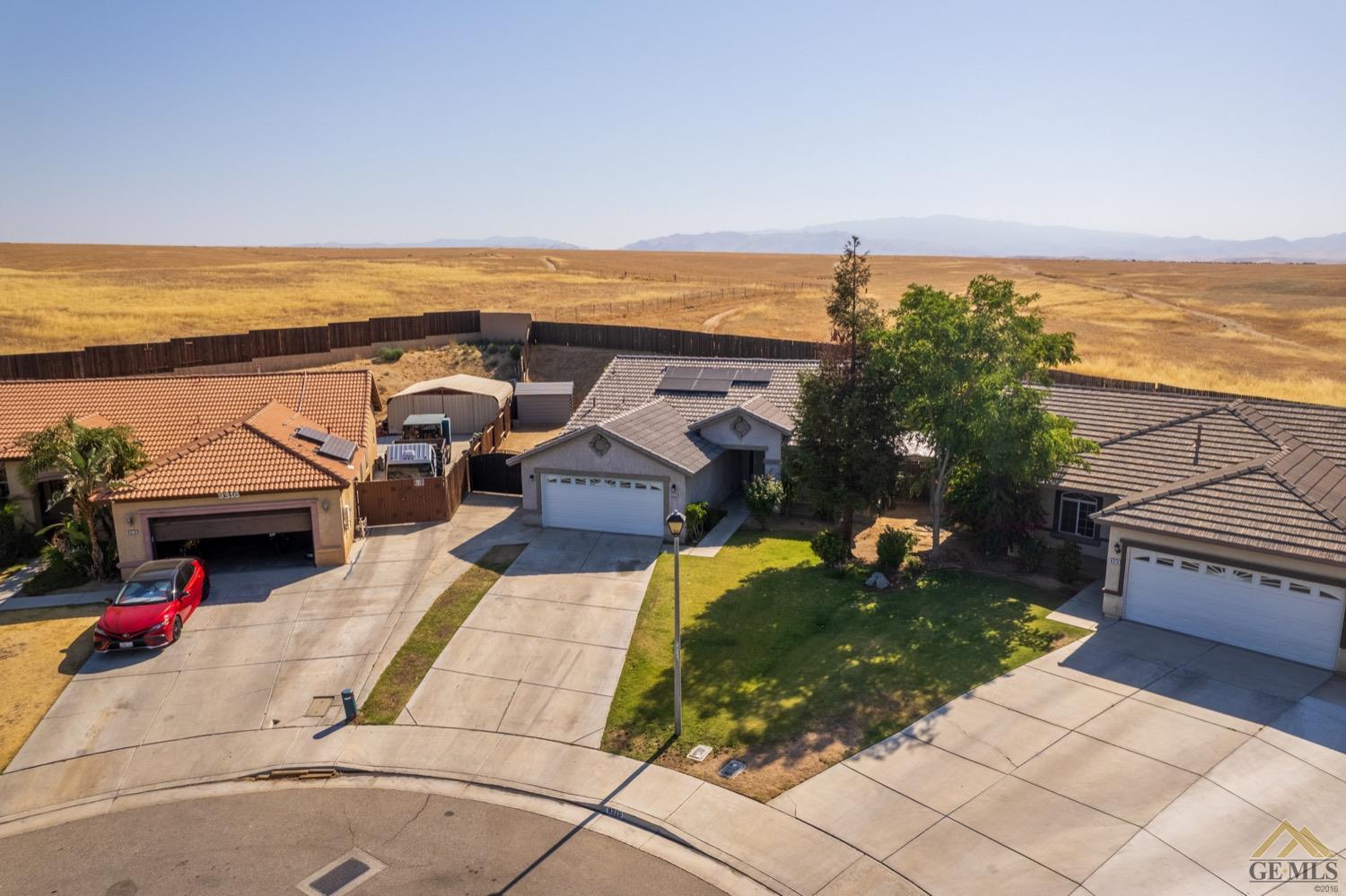Undisclosed Address Bakersfield, CA 93306 - Photo 2 of 28 a view of a terrace with lawn chairs