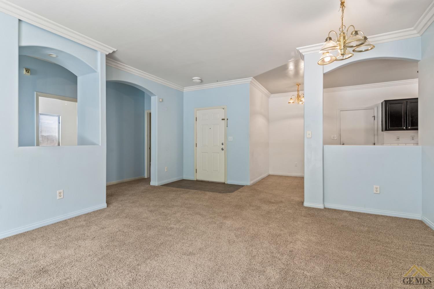 Undisclosed Address Bakersfield, CA 93306 - Photo 10 of 28 a view of a livingroom with an empty space