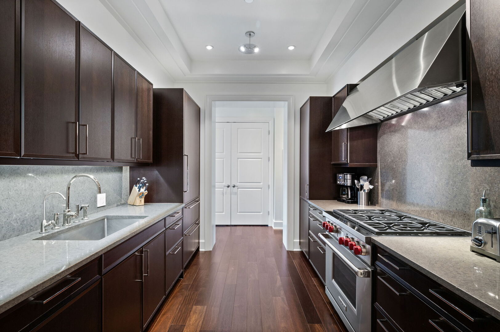118 East Erie Street, Unit 28F Chicago, IL 60611 - Photo 11 of 31 a kitchen with a stove and a sink