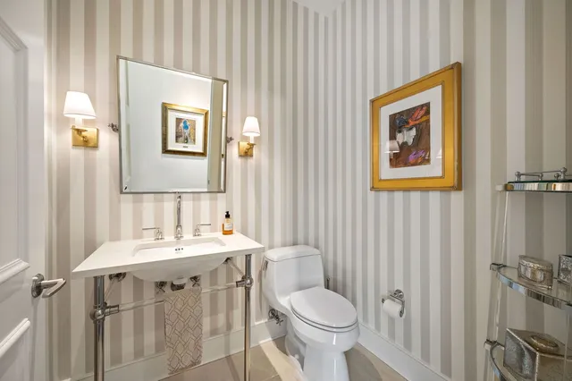 a bedroom with a bed and a table in it