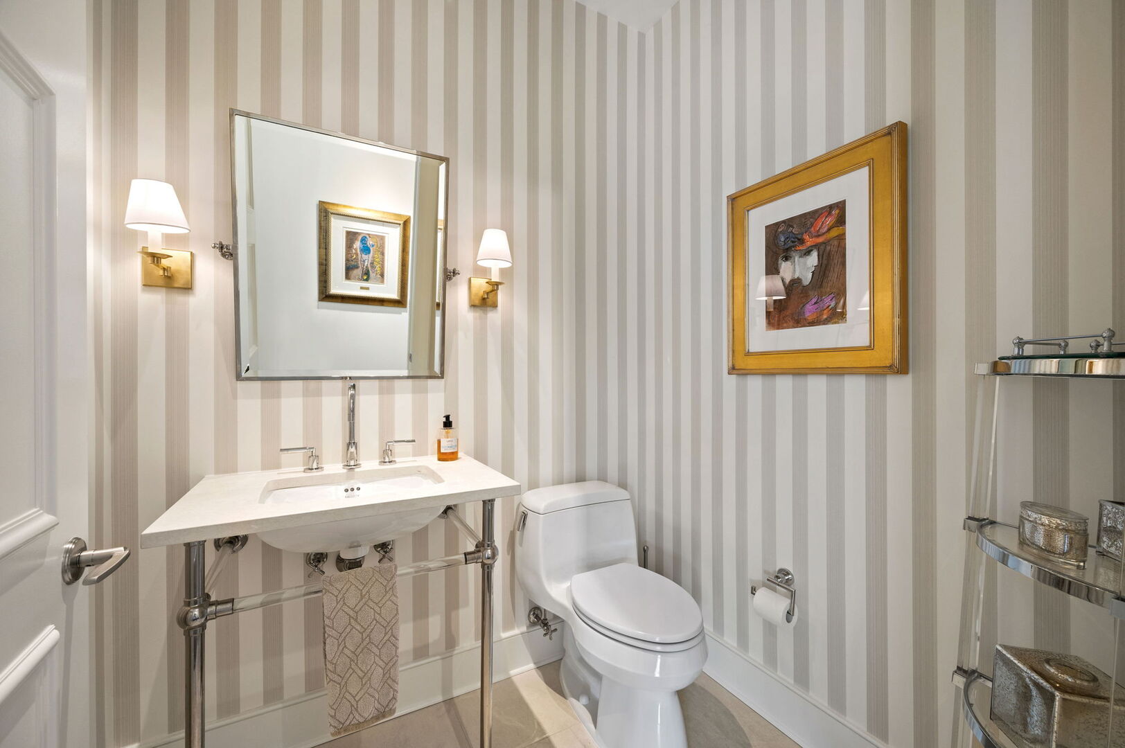 118 East Erie Street, Unit 28F Chicago, IL 60611 - Photo 13 of 31 a bathroom with a sink mirror vanity and toilet