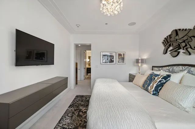 a bathroom with a bathtub and a sink