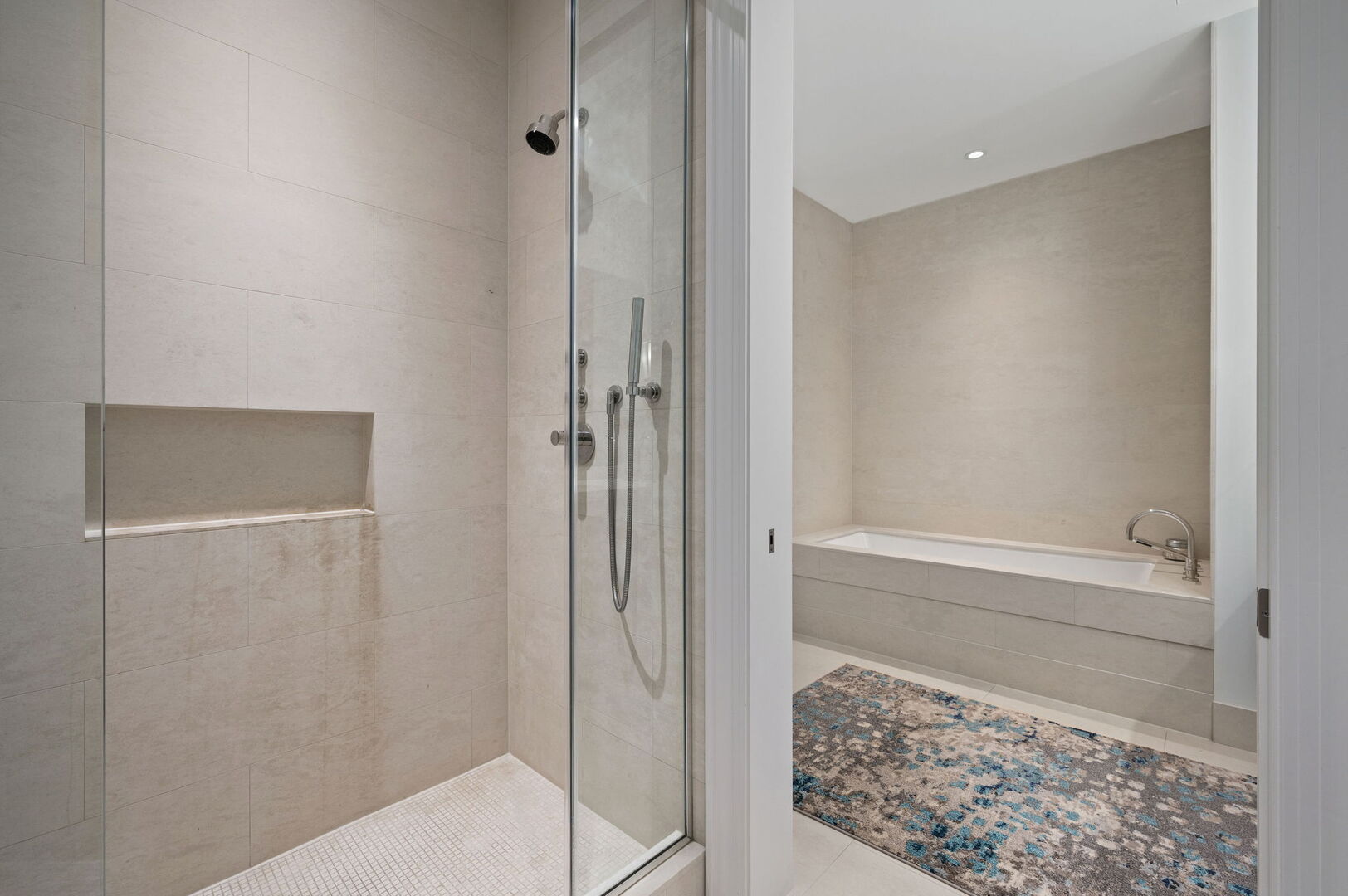 118 East Erie Street, Unit 28F Chicago, IL 60611 - Photo 17 of 31 a bathroom with a shower