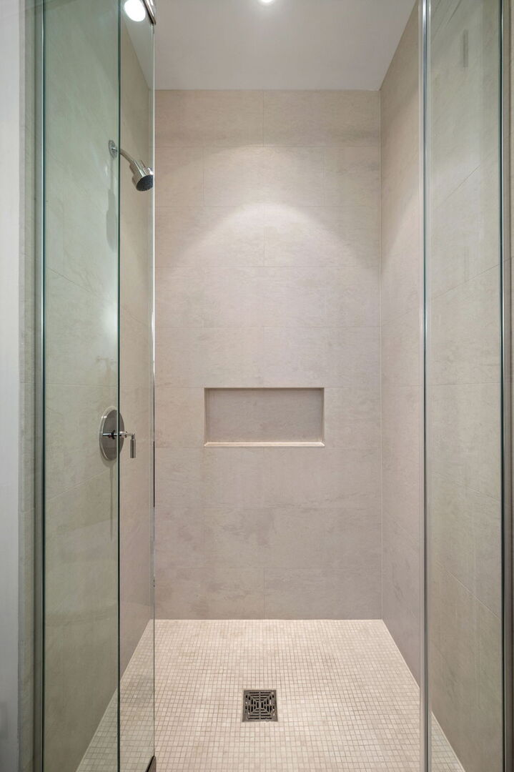 118 East Erie Street, Unit 28F Chicago, IL 60611 - Photo 20 of 31 a bathroom with a shower