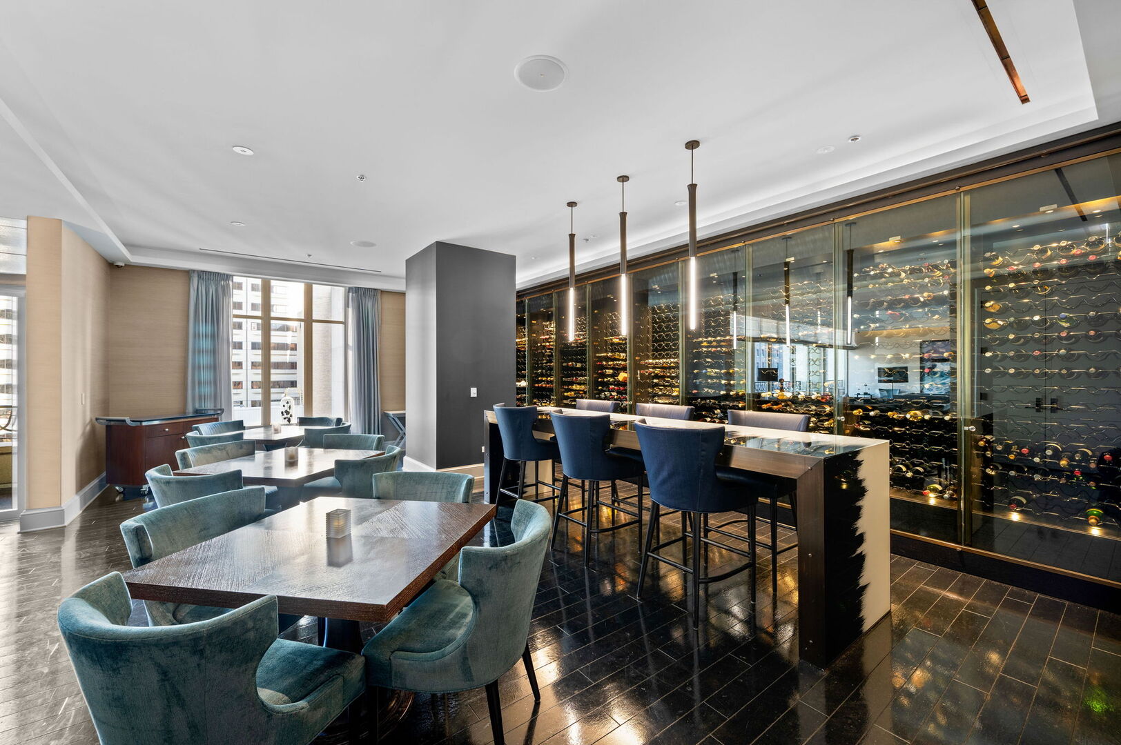 118 East Erie Street, Unit 28F Chicago, IL 60611 - Photo 27 of 31 a dining room with furniture a chandelier and wooden floor