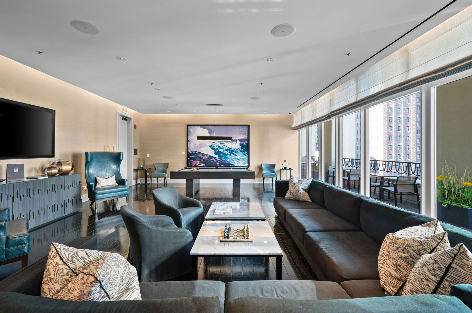 118 East Erie Street, Unit 28F Chicago, IL 60611 - Photo 28 of 31 a living room with furniture and a flat screen tv