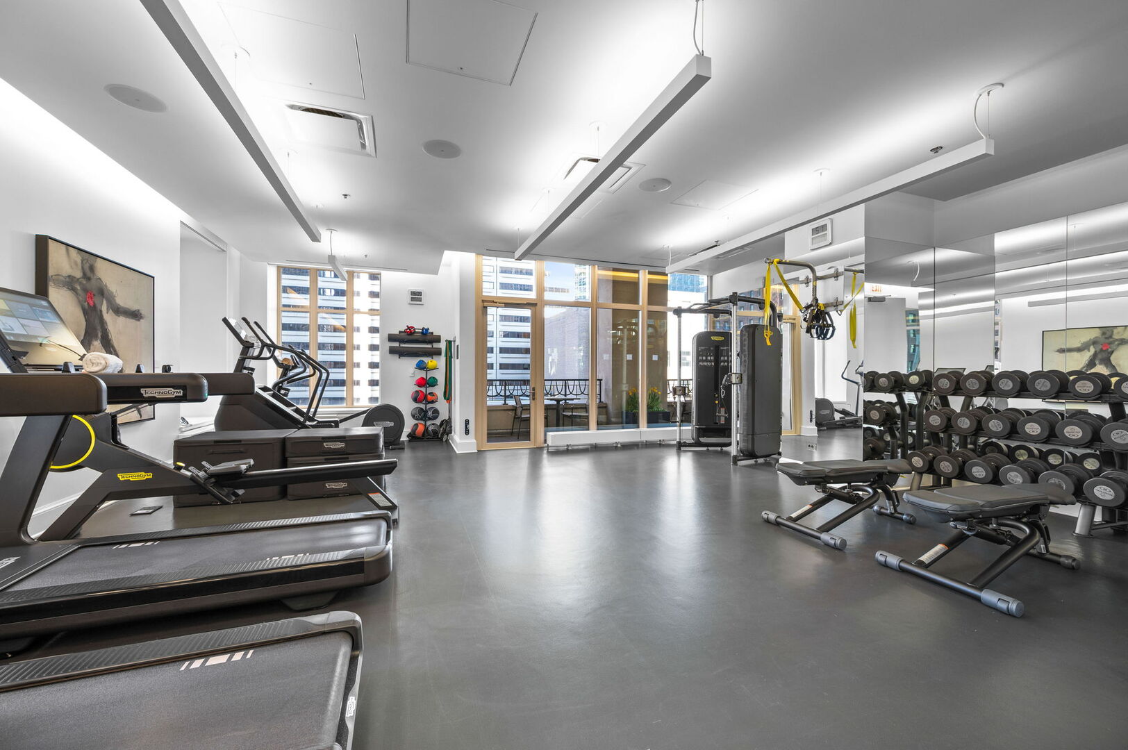 118 East Erie Street, Unit 28F Chicago, IL 60611 - Photo 29 of 31 a view of a room with gym equipment
