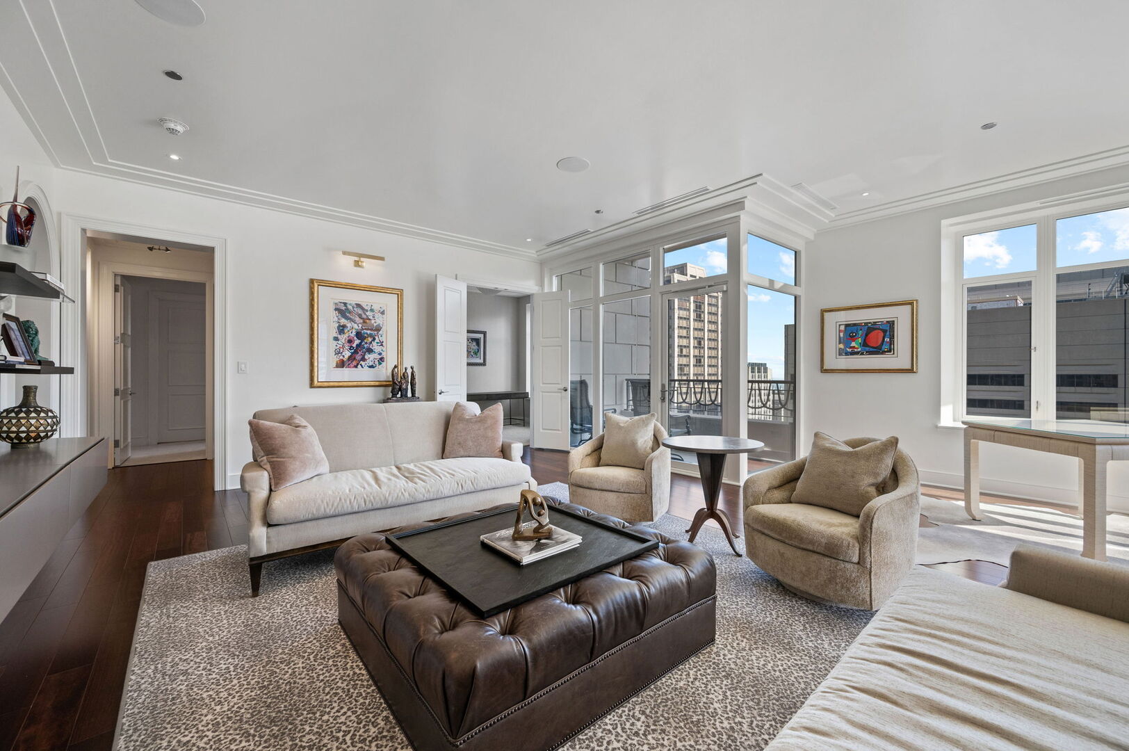 118 East Erie Street, Unit 28F Chicago, IL 60611 - Photo 8 of 31 a living room with furniture or couch and a large window