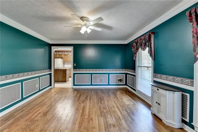 a view of a livingroom with wooden floor