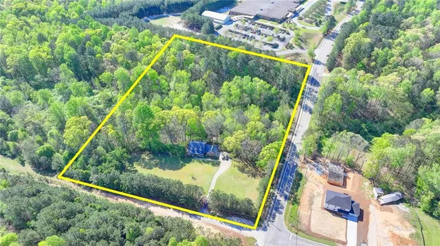 a view of swimming pool from a balcony