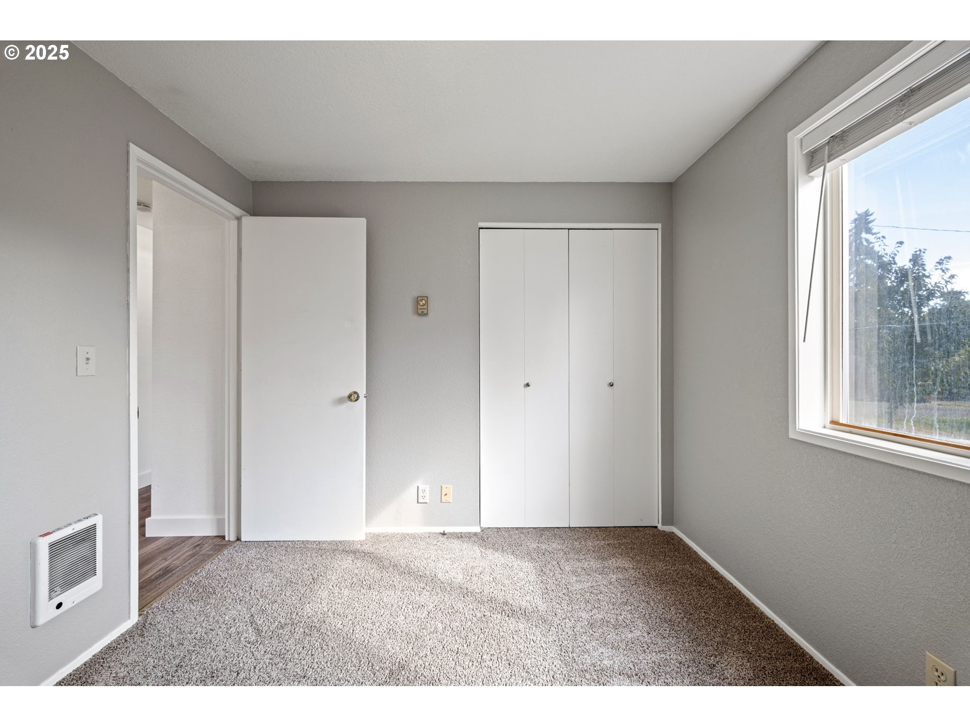 872 West N Street Springfield, OR 97477 - Photo 17 of 28 a view of an empty room with a window