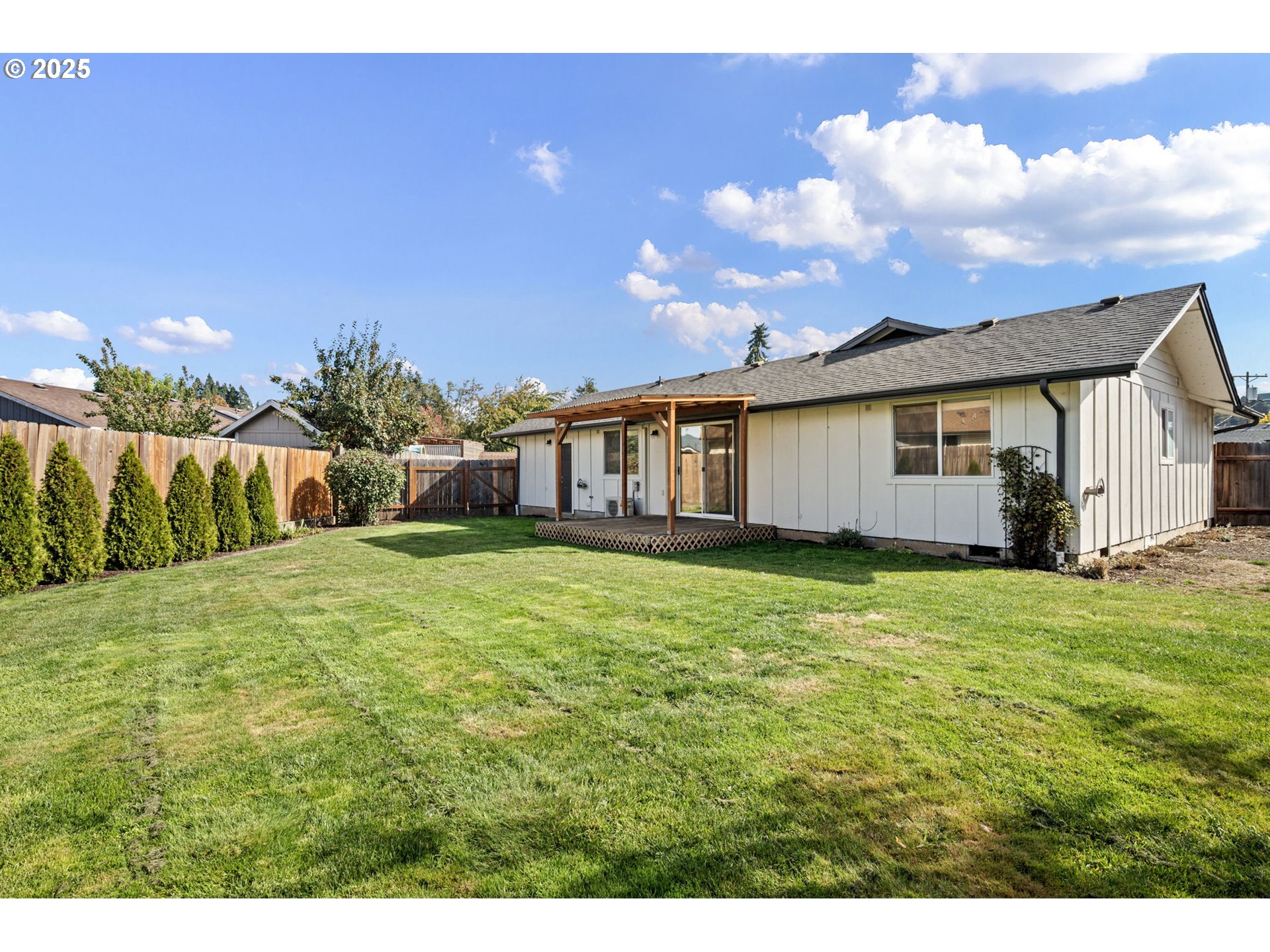 872 West N Street Springfield, OR 97477 - Photo 24 of 28 a front view of a house with a garden