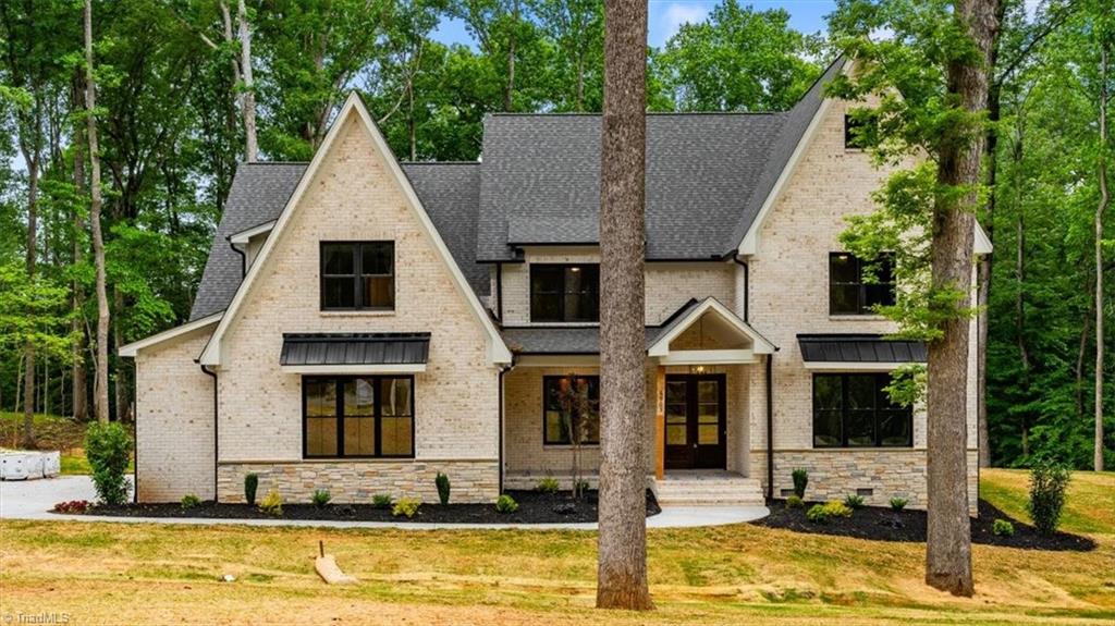6903 Tully Court Oak Ridge, NC 27310 - Photo 1 of 33 front exterior