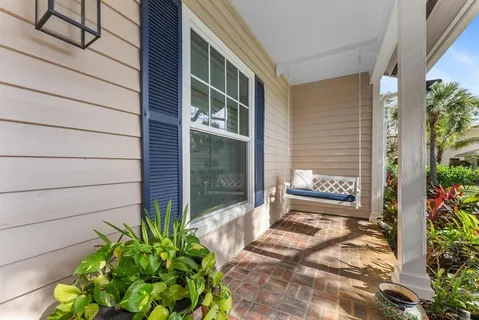 a living room with furniture or couch and a rug