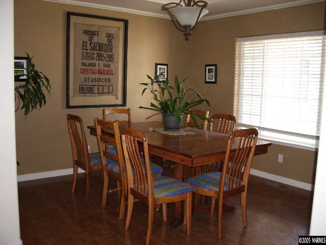 4387 Rancheria Road Fallon, NV 89406 - Photo 2 of 6 a dining room with furniture and window
