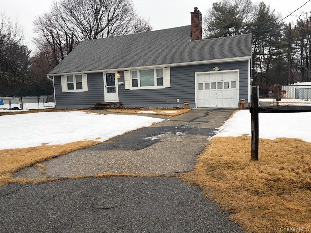 499 Old Country Road Deer Park, NY 11729 - Photo 1 of 21 a front view of a house with a yard