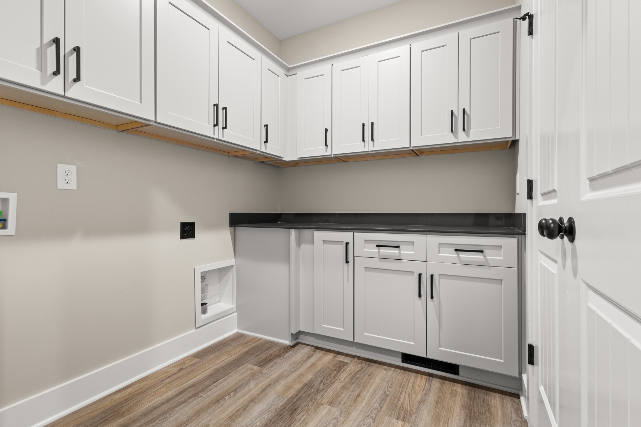 1228 Boulder Pass Road Clarksville, TN 37040 - Photo 14 of 26 a view of cabinets and wooden floor