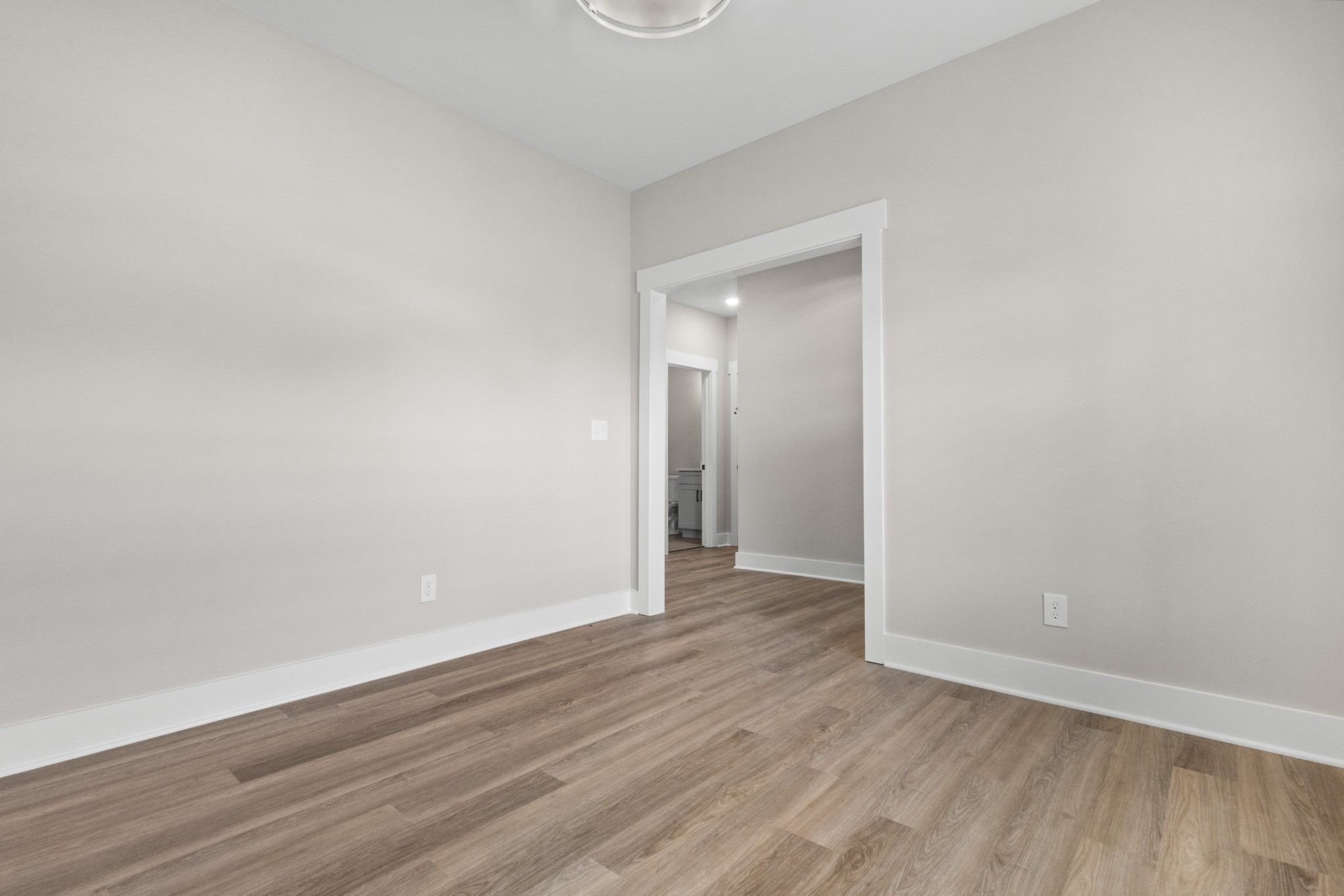 1228 Boulder Pass Road Clarksville, TN 37040 - Photo 4 of 26 a view of an empty room with wooden floor and closet