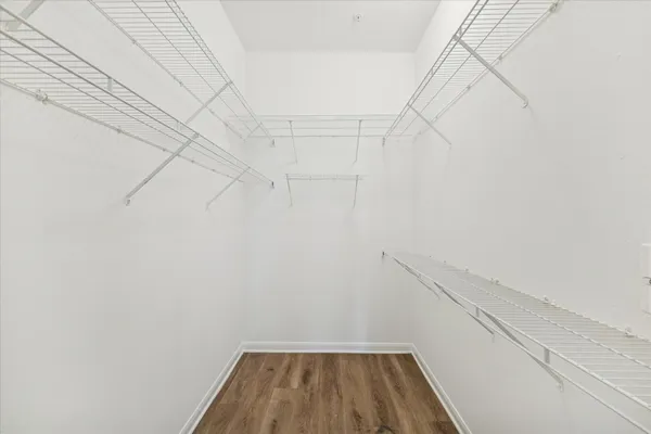 a view of a room with racks on the wall