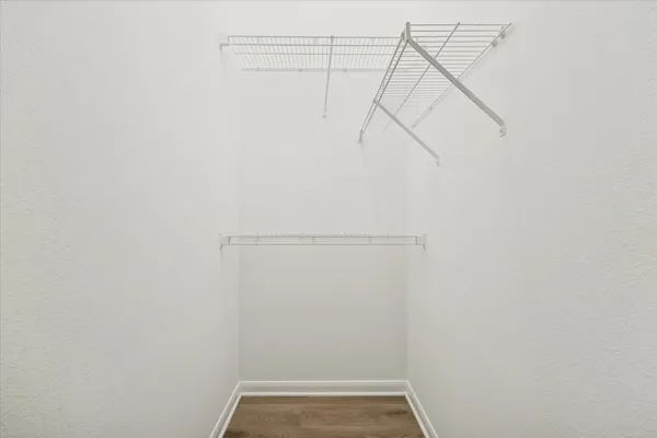 a view of small space with racks on the wall