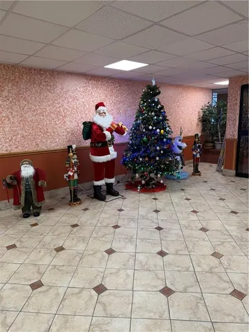 a view of entryway with flower pots