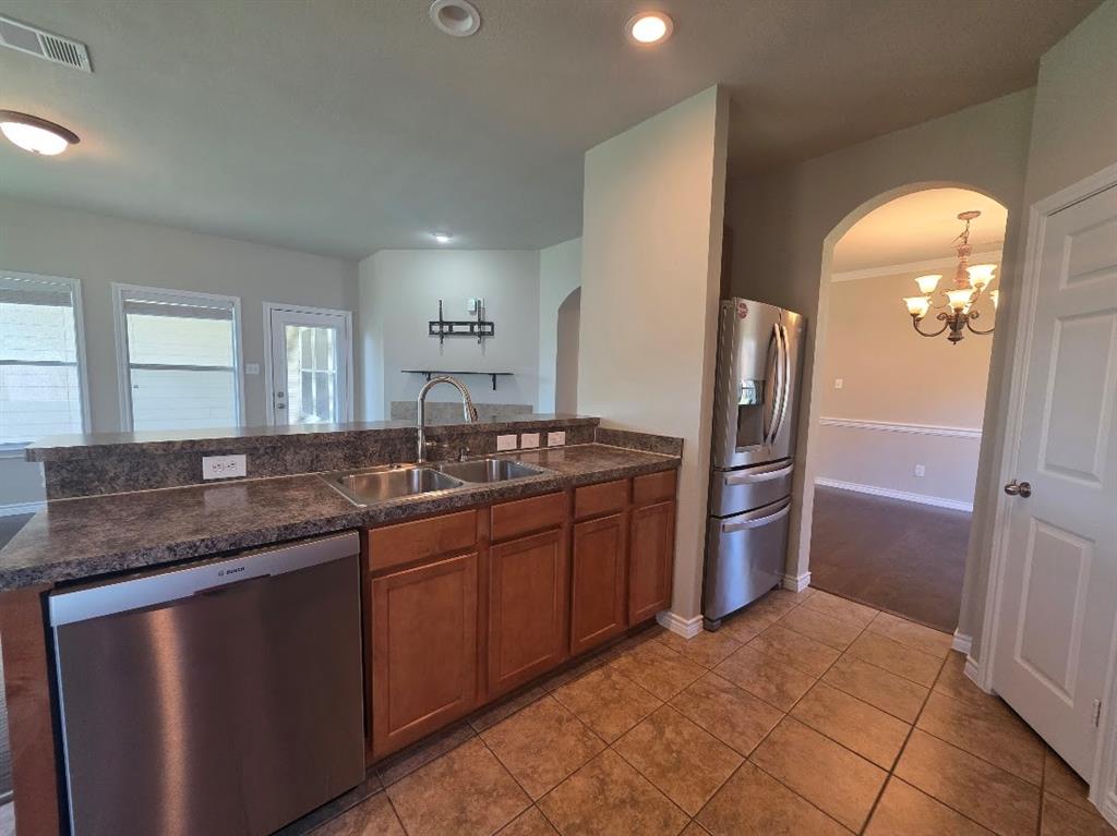 1327 Hl Vw Trail Wylie, TX 75098 - Photo 12 of 24 Kitchen opens to family the den