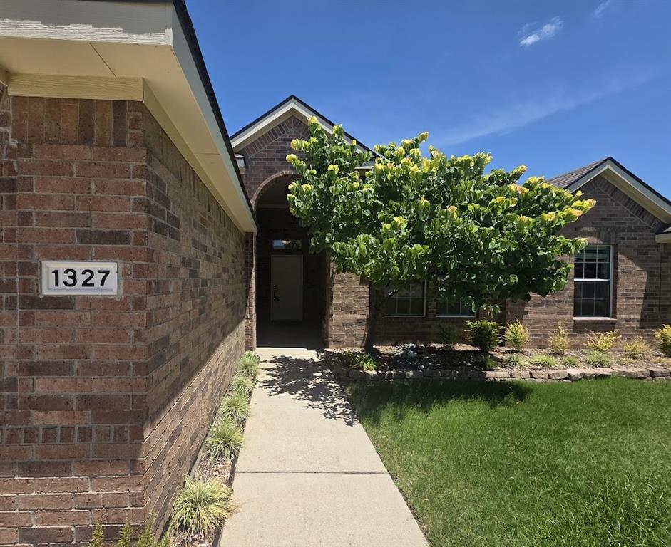 1327 Hl Vw Trail Wylie, TX 75098 - Photo 2 of 24 View of exterior entry featuring brick siding