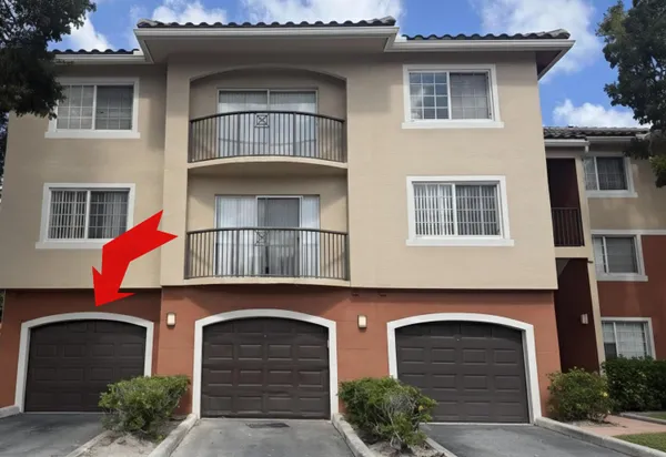 a front view of a house with a garage