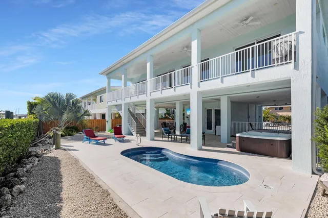a view of a building with sitting area