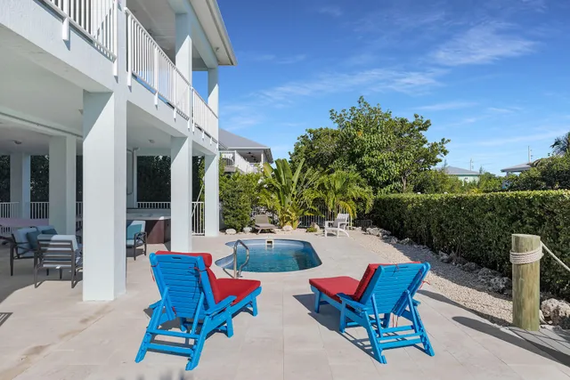 an aerial view of a house having yard