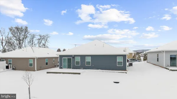 a front view of a house with a garage