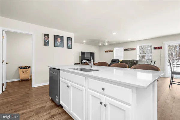 a kitchen with counter top space and sink